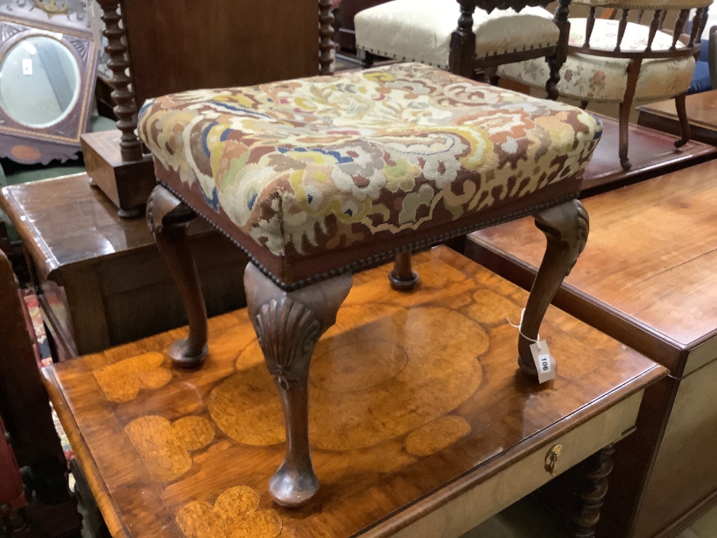 A Queen Anne style carved walnut stool